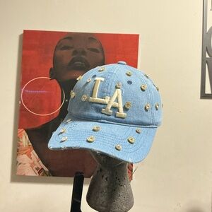 Fashion Nova Blue Cap with Gold Accents